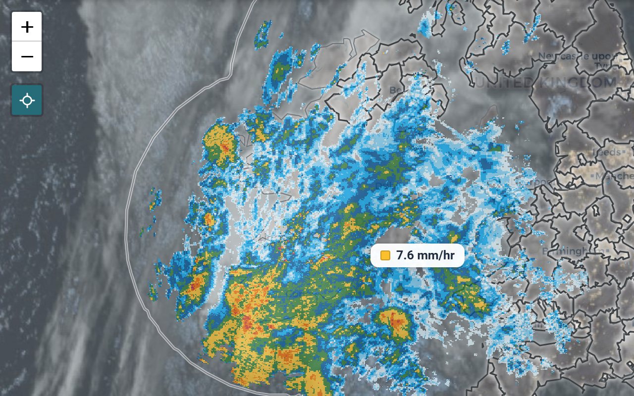 The radar map with the crosshair button pressed under the zoom buttons, and a reading of 7.6 mm/hr beside the cursor over a band of rain.